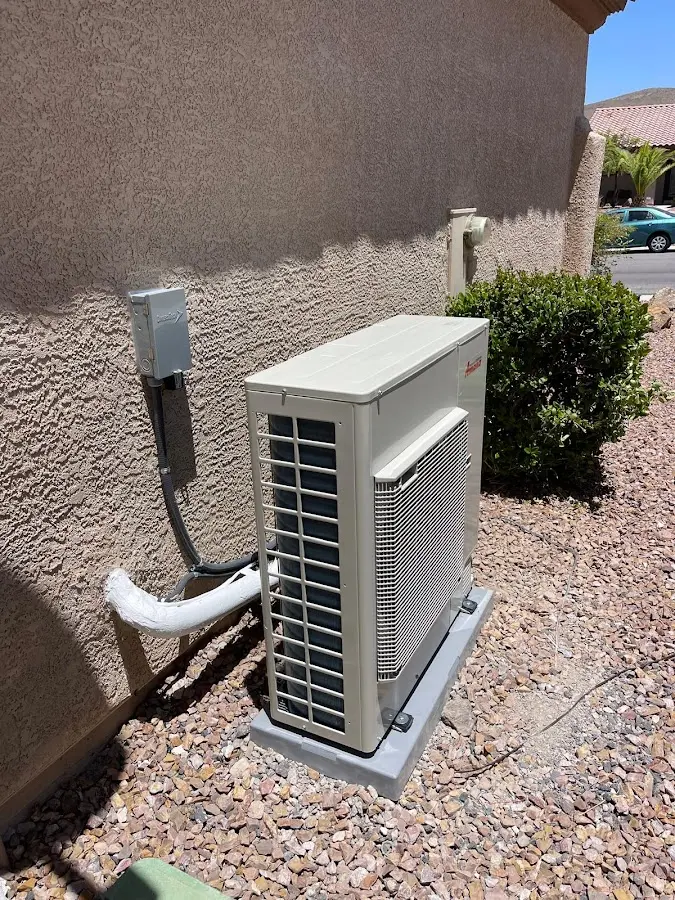 Residential air conditioning condenser unit in Independence